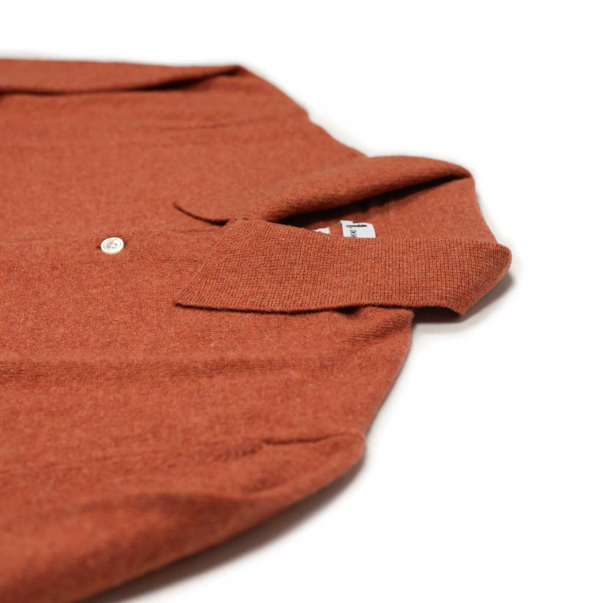 Aaric classic polo sweater in orange wool mix